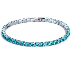 18 K white gold with aquamarine stones tennis bracelet